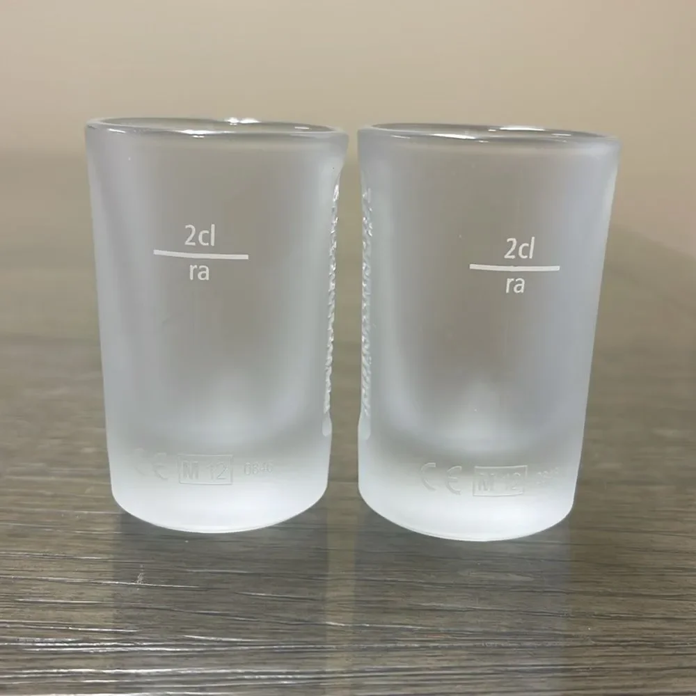 Pair of Embossed Jagermeister Frosted Glass 1 fl. oz Shot Glasses Barware Bar